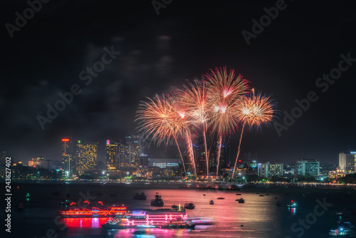Fireworks international colorful Pattaya beach cityscape at night scene for advertise traveling event holiday., Pattaya city