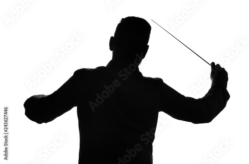 Silhouette of male orchestral conductor on white background