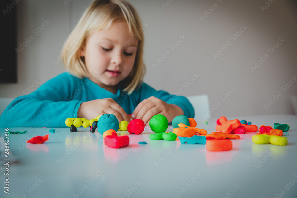 Child playing with clay molding shapes, kids crafts Child playing with clay molding shapes, kids crafts