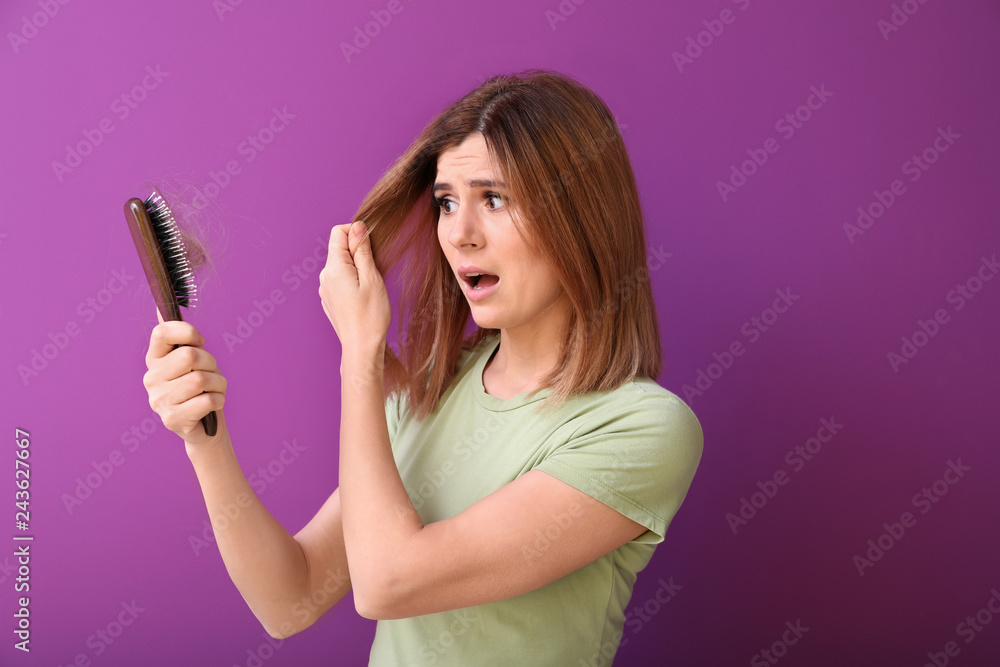 Woman with hair loss problem on color background Woman with hair loss problem on color background