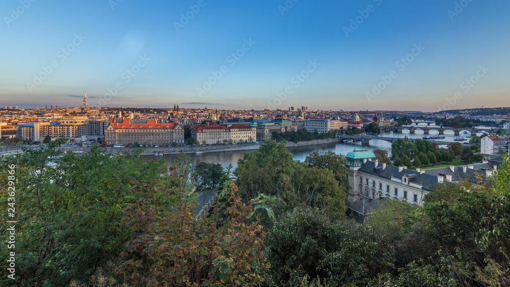 Evening sunset Panorama of Prague with Vltava river and Prague Bridges timelapse.