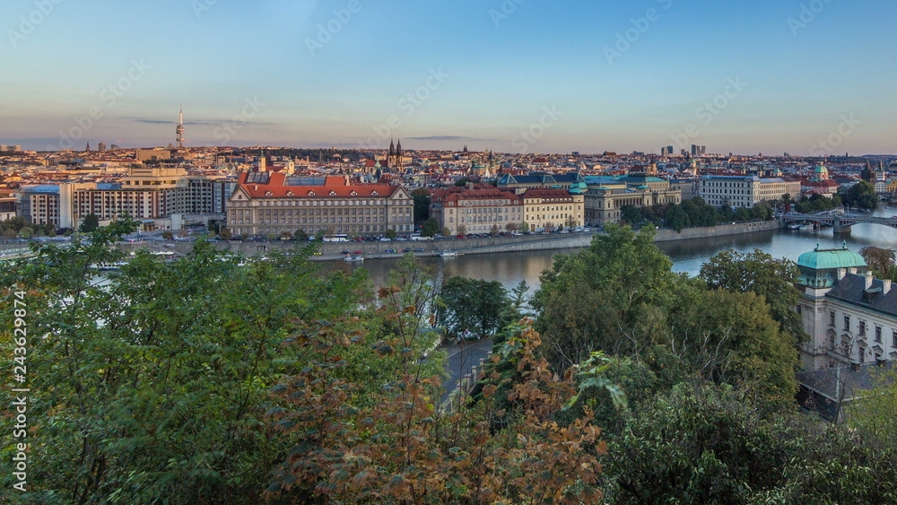 Evening sunset Panorama of Prague with Vltava river and Prague Bridges timelapse.