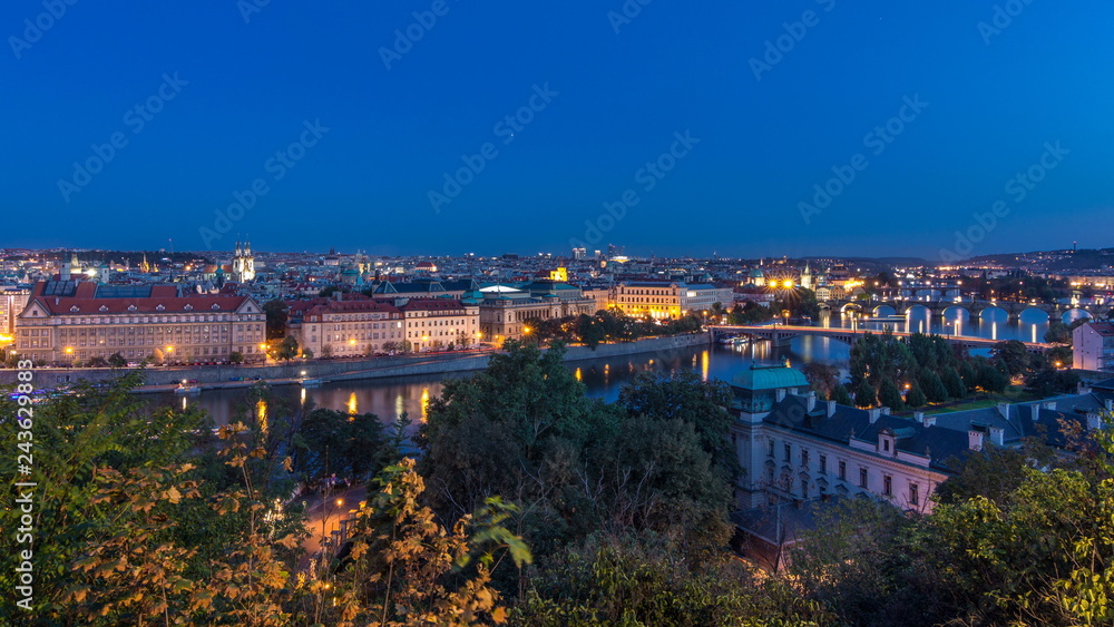 Evening Panorama of Prague with Vltava river and Prague Bridges day to night timelapse.