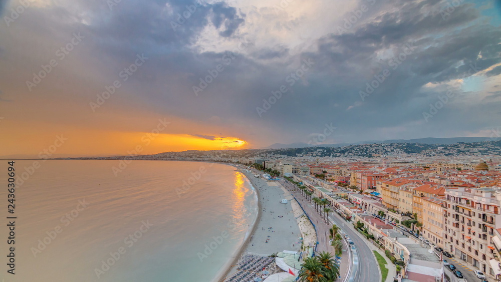 Sunset over Nice city and Mediterranean Sea aerial timelapse