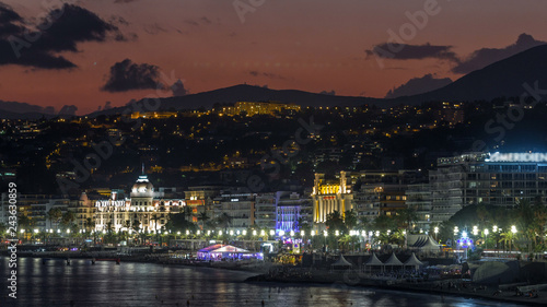 Waterfront of Nice city and Mediterranean Sea day to night timelapse