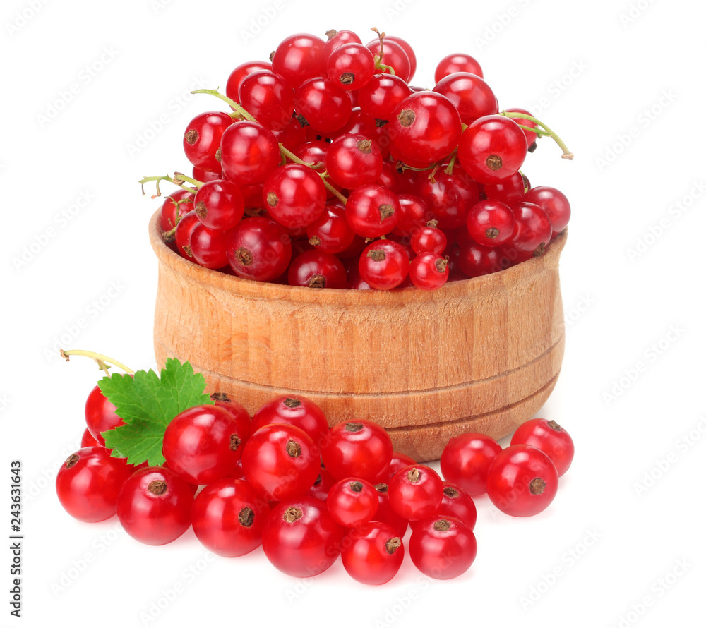 red currant in wooden bowl with green leaf isolated on white background. healthy food red currant in wooden bowl with green leaf isolated on white background. healthy food