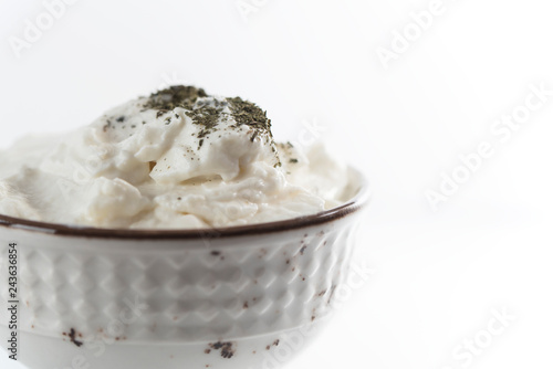 Bowl of healthy yogurth, close up, isolated photo