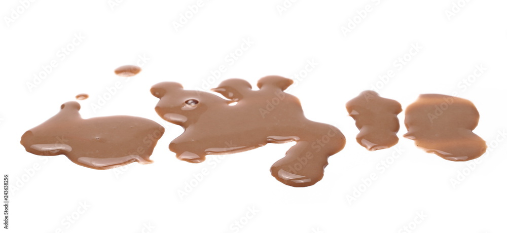 Spilled chocolate milk puddle isolated on white background Spilled chocolate milk puddle isolated on white background