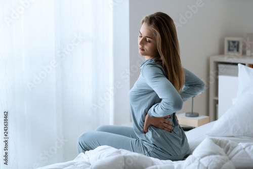 Woman with back ache