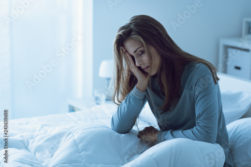 Valokuvatapetti Depressed woman awake in the night