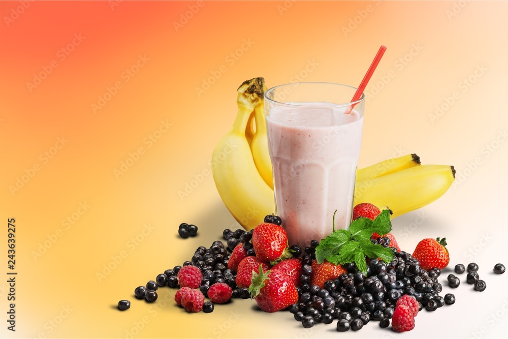 Healthy Fruit Smoothie in glass on wooden table Background Healthy Fruit Smoothie in glass on wooden table Background
