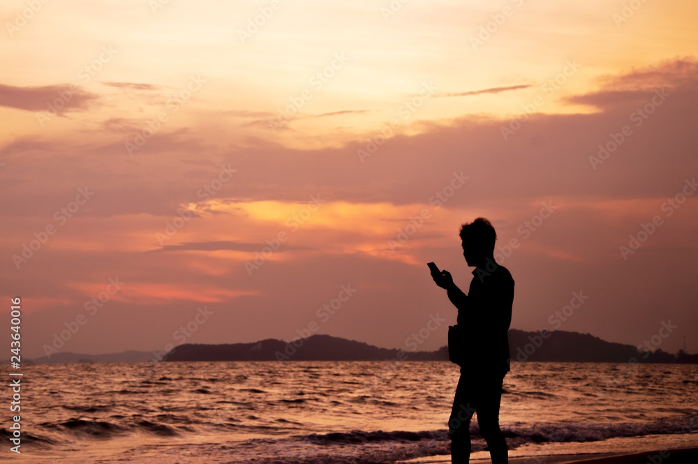 A man keep memories with camera phone in his hand