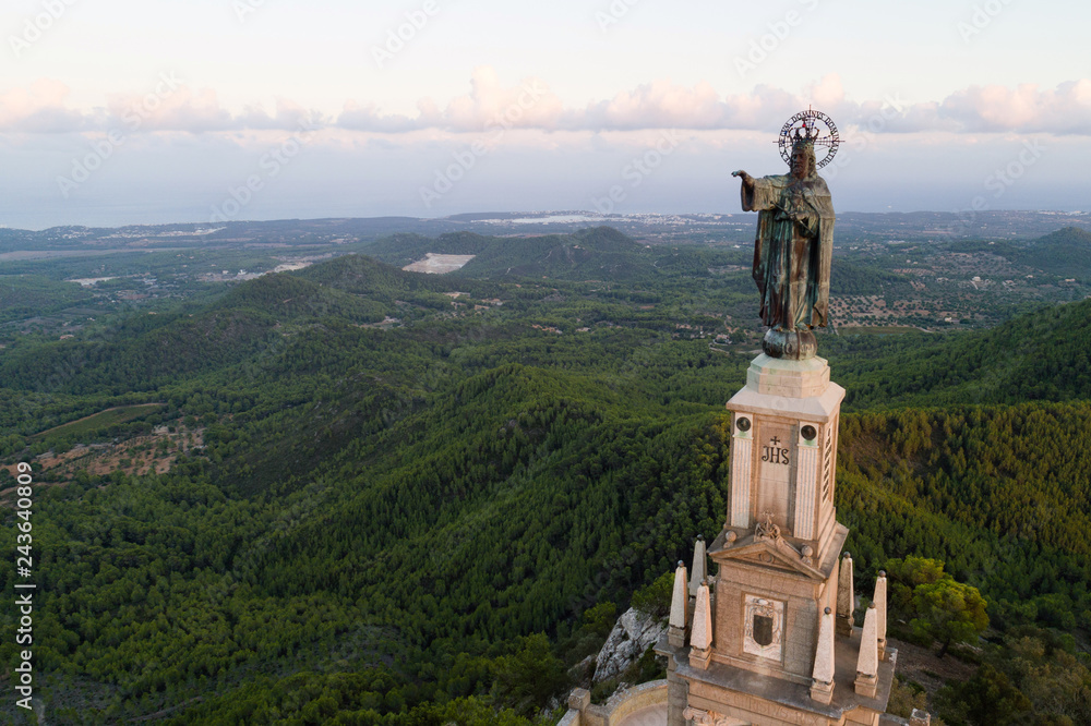 Aerial view of Jesus Christ statue at Sant Salvador Sanctuary, Mallorca island, Spain