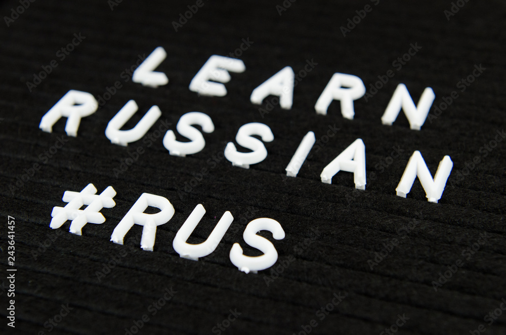Fototapeta premium Learn Russian, RUS abbreviation, simple sign on black background, great for teachers, schools, students