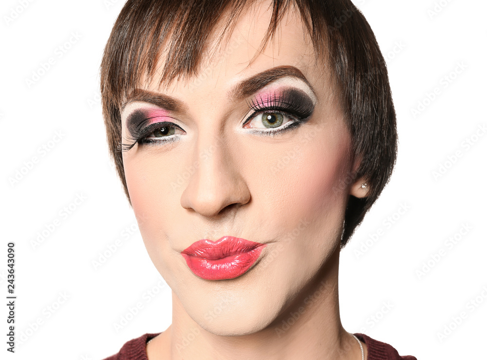 Portrait of transgender man with bright makeup on white background Portrait of transgender man with bright makeup on white background