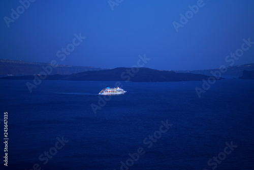Colorful night view of a cruise ship in Oia, Santorini © jekatarinka