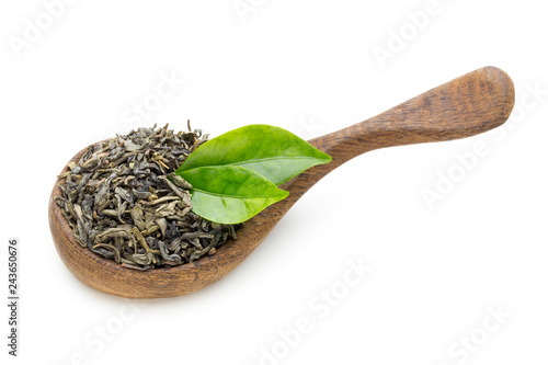 Green tea leaf the spoon isolated on white background.