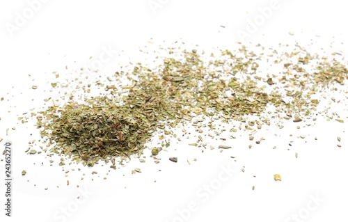 Pile of dried oregano leaves isolated on white background