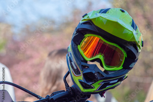 Green motorcycle helmet.