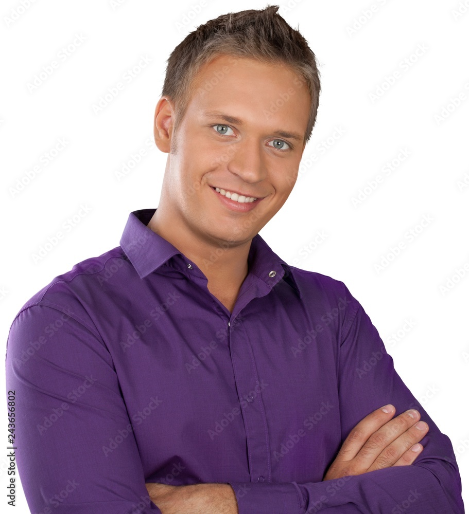 Causually dressed male with his arms crossed Causually dressed male with his arms crossed
