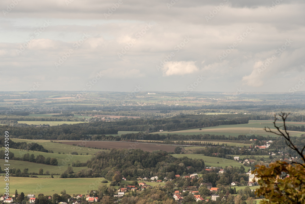 Fototapeta premium autumn countryside with mix of villages, meadows, fields and forest