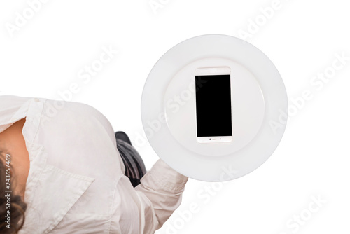 Mobile phone served on empty serving plate. Top view of a waitress in a white blouse on the white background. Concept. Isolated