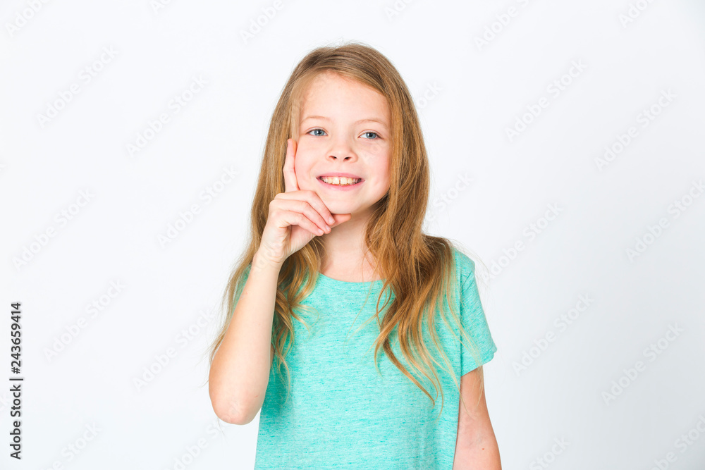 portrait of young pretty blonde girl thinking in front of white background portrait of young pretty blonde girl thinking in front of white background