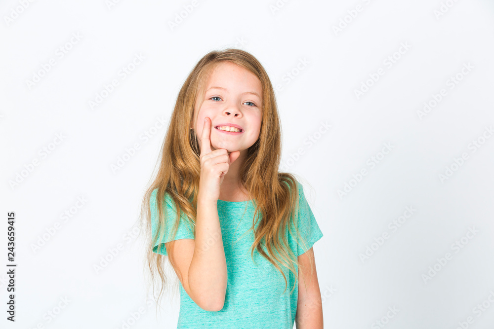 portrait of young pretty blonde girl thinking in front of white background portrait of young pretty blonde girl thinking in front of white background