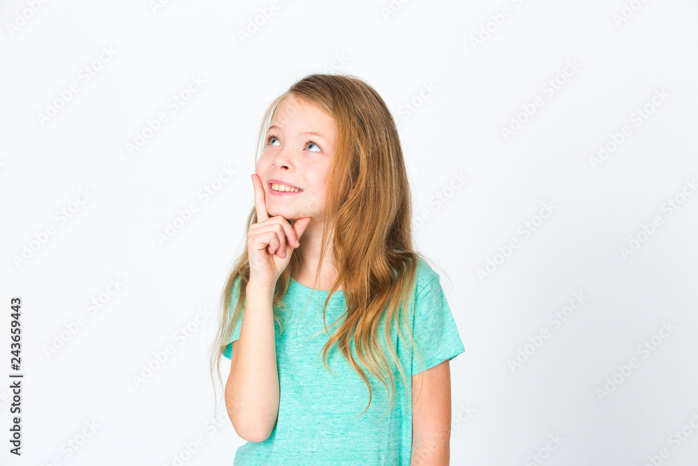 portrait of young pretty blonde girl thinking in front of white background portrait of young pretty blonde girl thinking in front of white background