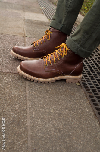 wearing boots on the street © Douglas