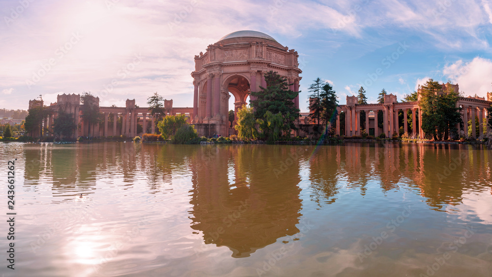 Palace of fine arts reflecting in a pond in front of it. San Francisco, California.