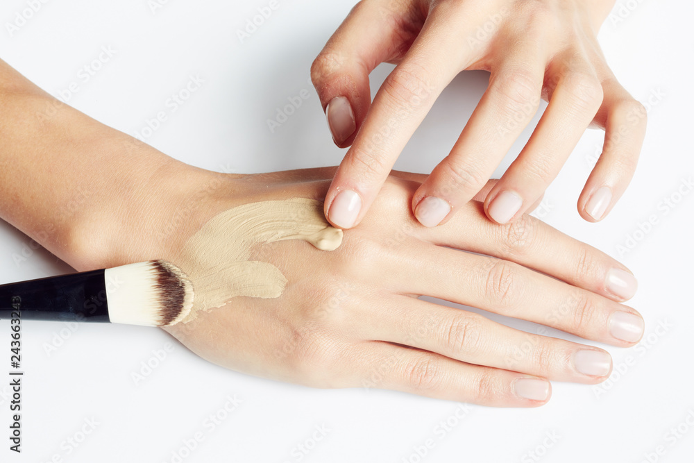 Fototapeta premium Hand with make up