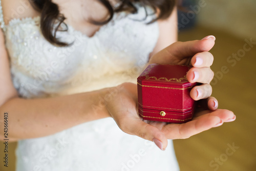 Wedding ring. The bride is holding a box with wedding rings