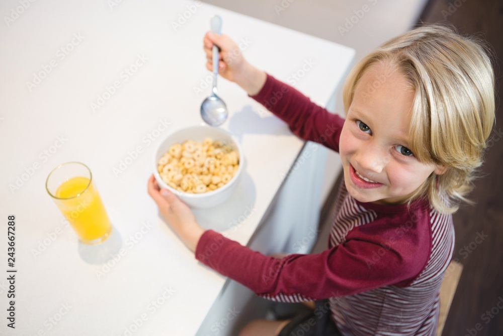 Boy having his breakfast at home Boy having his breakfast at home
