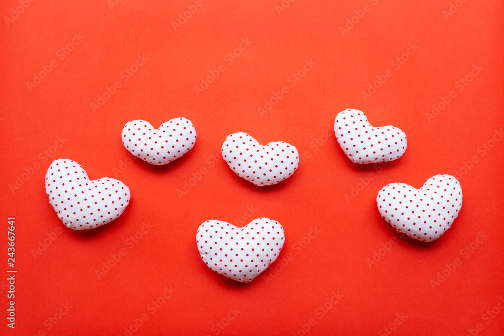 Fototapeta premium Valentine's hearts on red background