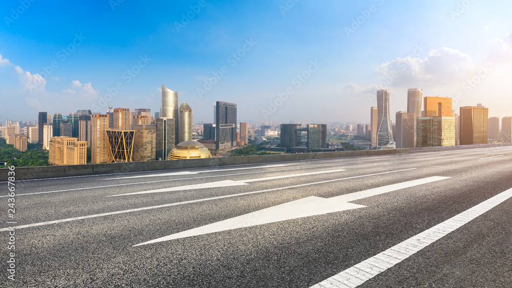 Empty asphalt road and city skyline in hangzhou,high angle view