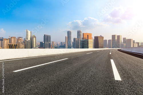 Empty asphalt road and city skyline in hangzhou,high angle view