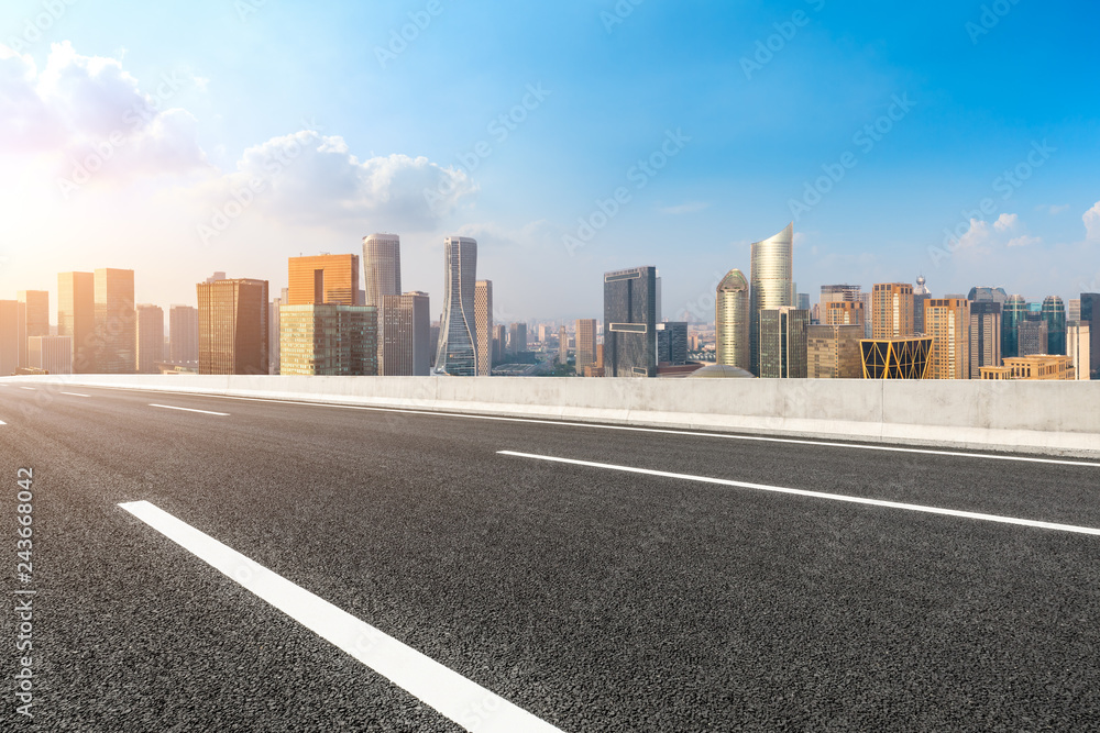 Empty asphalt road and city skyline in hangzhou,high angle view Empty asphalt road and city skyline in hangzhou,high angle view