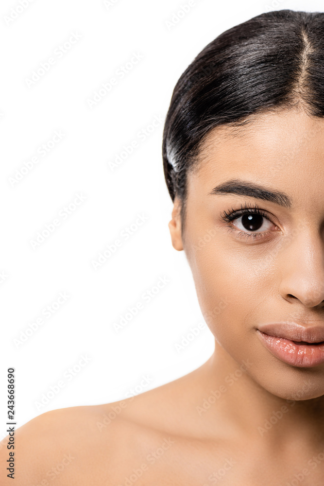 Fototapeta premium cropped shot of beautiful young african american woman looking at camera isolated on white