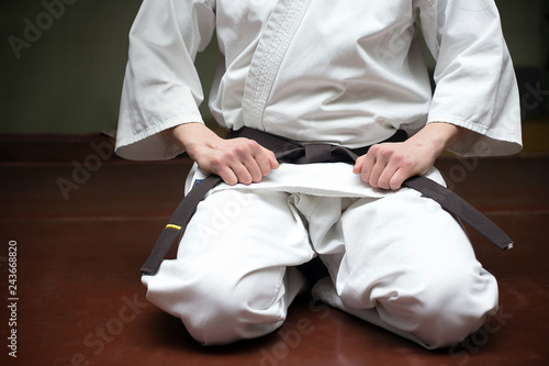 male martial arts coach in a gym
