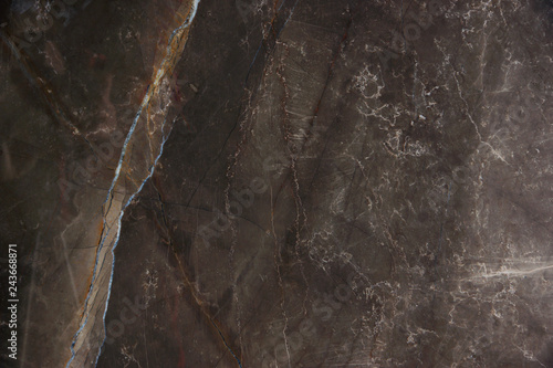 Natural stone brown marble with thin veins, called Bronze Amani photo