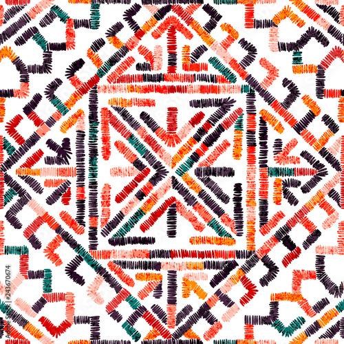 Embroidered seamless geometric pattern. Ornament for the carpet. Ethnic and tribal motifs. Colorful print of handmade. Vector illustration.