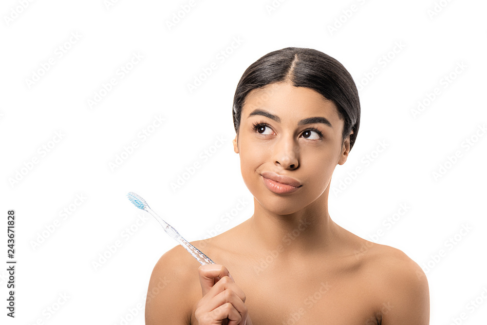 thoughtful naked african american girl holding toothbrush and looking away isolated on white