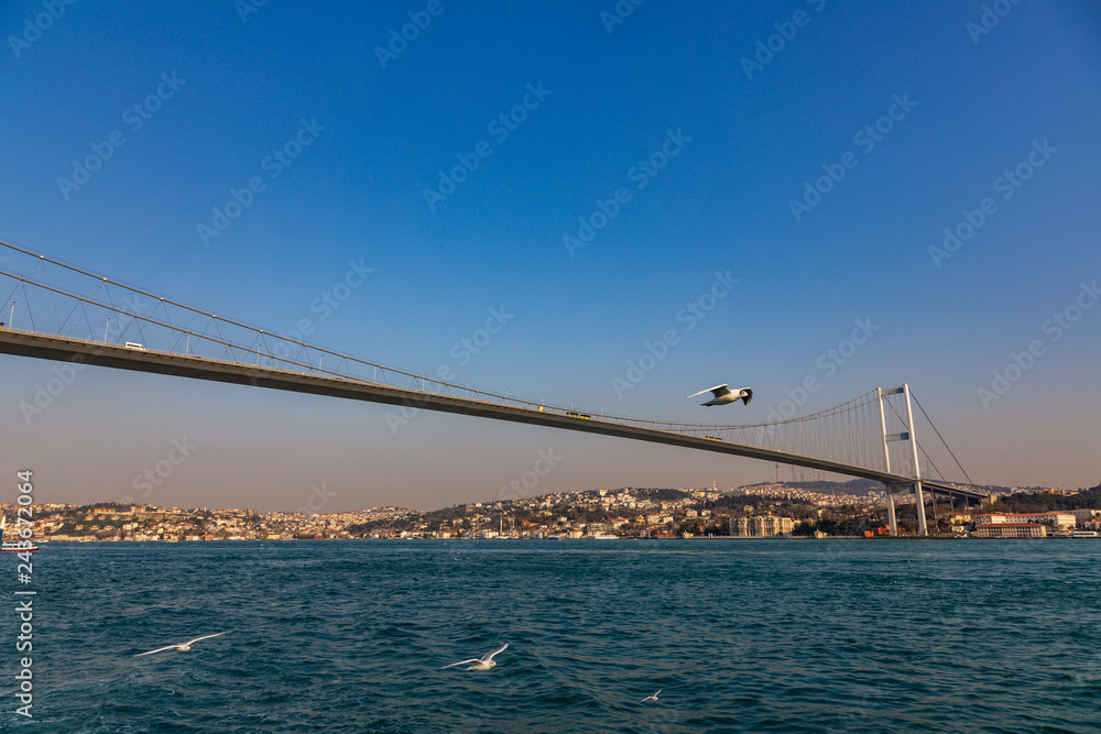 The grand bridge of Sultan Mehmed Fatih through the Bosphorus, Turkey The grand bridge of Sultan Mehmed Fatih through the Bosphorus, Turkey