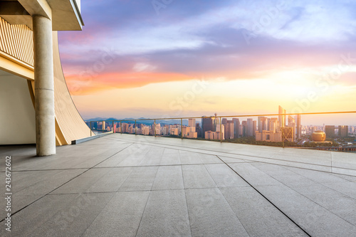 Empty floor and city skyline at sunrise in hangzhou,high angle view