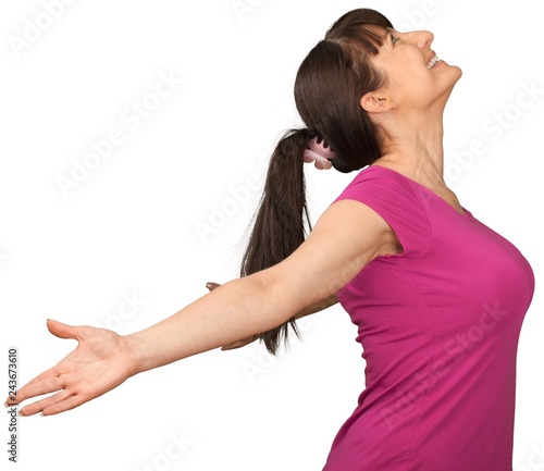 Woman spreading arms and pushing chest out