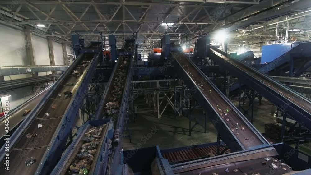 Waste processing plant. Waste on shipping tape. Waste sorting Waste processing plant. Waste on shipping tape. Waste sorting