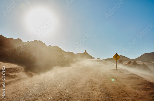 Chile, Valle de la Luna, San Pedro de Atacama, sand track in sandstorm photo