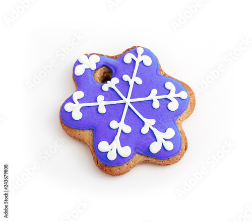 Homemade violet gingerbread Christmas cookie, isolated on white. Holiday decoration, winter time food.