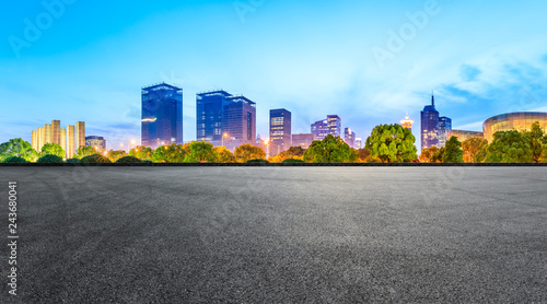 Asphalt square ground and city skyline with buildings in Shanghai at night